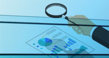 Lawyers hand with magnifying glass and paper with report underneath the glass, with blue filter 