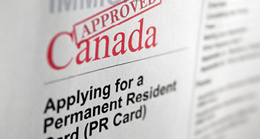 Canada PR approval notice with 'Approved' stamp