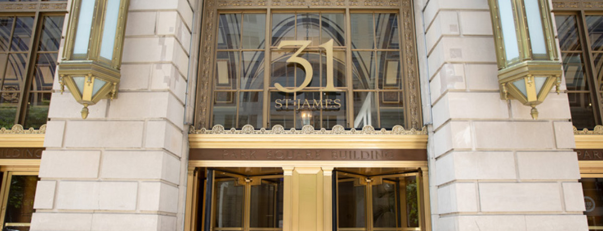 Front door of James Building with gold framed doors