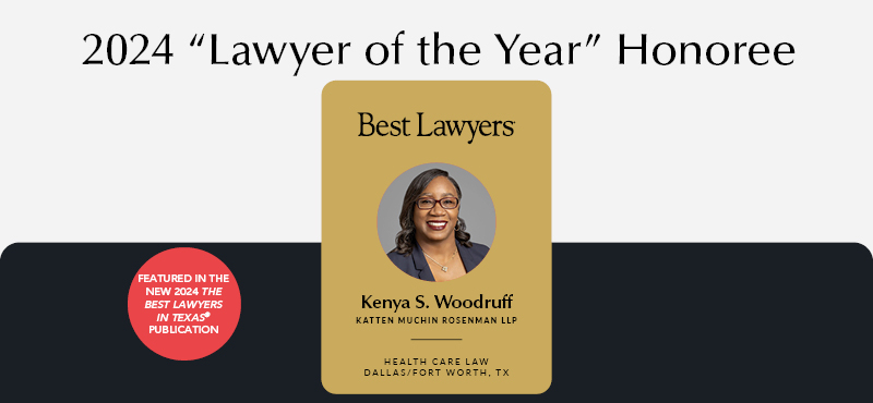 Woman in suit posing for headshot photo