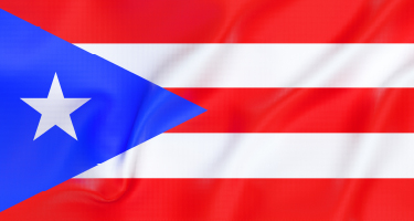 Blue triangle with white star beside red and white stripes