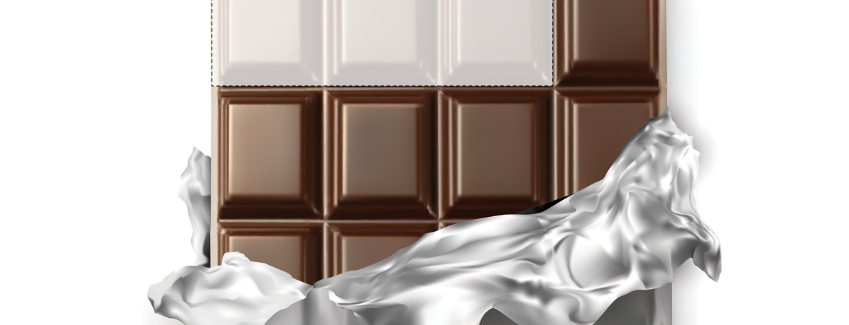 Chocolate bar being unwrapped from foil