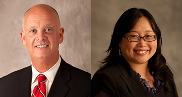 Headshot of male lawyer in dark suit and red tie, and headshot of female lawyer in dark suit and gla