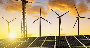 Windmills in front of a setting sun