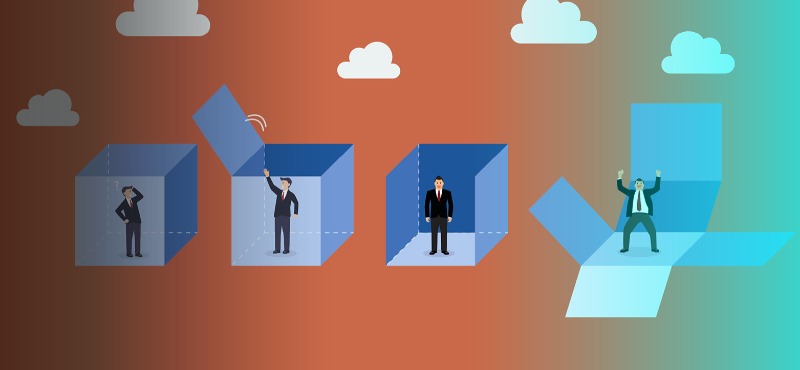 Four businessmen standing inside of four boxes with orange background and teal border 