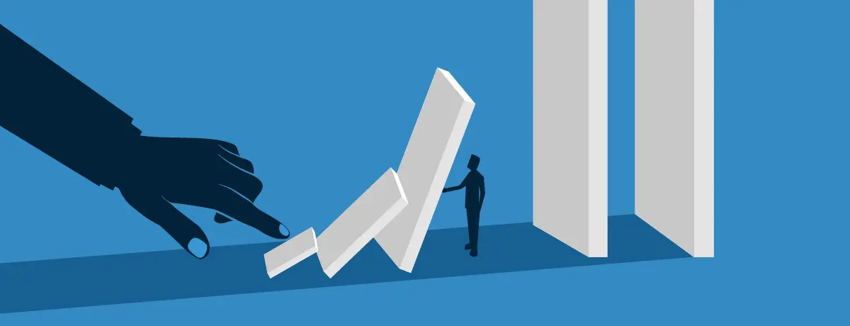 A silhouette of a large hand pushing over a row of falling dominos toward a small figure standing be