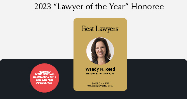 Woman with red shirt and black jacket with brown hair