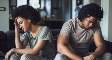 Resigned couple going through divorce