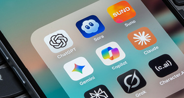 Smartphone screen showing icons for AI apps like ChatGPT, Gemini, Claude and Copilot.