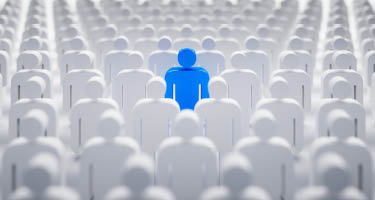 A Blue Person in the Middle of White People