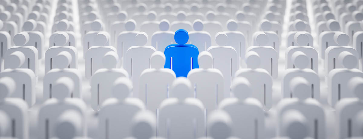 A Blue Person in the Middle of White People