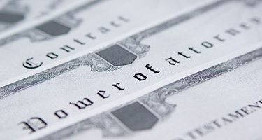 Close-up of a power of attorney document, symbolizing legal authority, revocation rights, guardiansh