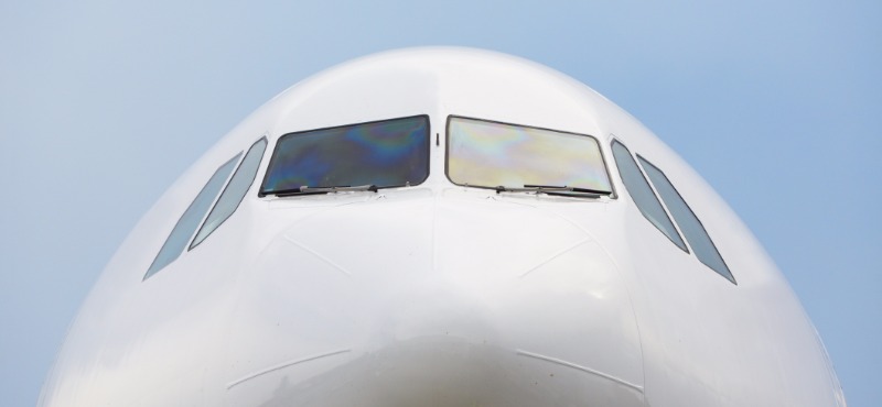 Airplane with blue background and windows