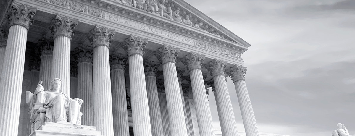 Court house in black and white cloudy sky