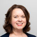 Headshot of woman with short brown hair